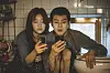 A scene from 'Parasite' featuring actors Park So-dam, left, and Choi Woo-shik [CJ ENM]