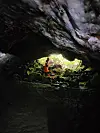Local reporters finally reach the exit of the Bwengdwigul Lava Tube last week after walking and crawling across a part of it, located closest to Geomunoreum where the volcano erupted and has the complex labyrinth of small lava tubes that stretch out like a spider web. [YIM SEUNG-HYE]