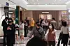 People shop for luxury fashion items at a department store in Seoul in April last year. [YONHAP]
