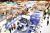Pictured is the show floor of the 76th World Franchise Expo 2025 at Coex in Gangnam District, southern Seoul, on the morning of Jan. 23. The trade show, which runs Jan. 23 through Jan. 25 in the venue's Hall D, aims to connect franchises with aspiring entrepreneurs, with exhibitors including Alpha Box, Queensbrown and Penguinhouse. [YONHAP]