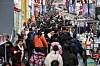 People throng a street in Myeong-dong, central Seoul, on New Year's Eve on Sunday. [YONHAP]