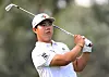 Kim Joo-hyung wears his Presidents Cup bracelet as he plays his shot from the 12th tee during the final round of the Shriners Children's Open at TPC Summerlin on Oct. 9 in Las Vegas, Nevada. [AFP/YONHAP]