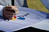 Rory Mcilroy writes his name in Korean letters, hangul, on Wednesday morning ahead of the CJ Cup at Congaree Golf Club in Ridgeland, South Carolina. [GETTY IMAGE FOR THE CJ CUP]