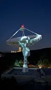 Media artwork ″Iris″ is projected on to an antenna used by KAIST's next-generation small satellite to send G-Dragon's song ″Home Sweet Home″ (2024) to space on April 9. [KAIST]