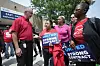 United Auto Workers President Shawn Fain, left, talks with autoworkers outside the General Motors Factory Zero plant in Hamtramck, Michigan on July 12. [AP/YONHAP]