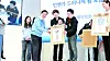A pediatric cancer patient and families pose for a picture at a symposium about child cancer which was held last November at Seoul National University Hospital in Seoul. [SEOUL NATIONAL UNIVERSITY HOSPITAL]