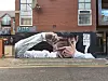 A graffiti mural of Son Heung-min is seen on the side of a building in Tottenham, London. [SCREEN CAPTURE]