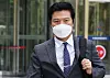 Gangseo District Chief Kim Tae-woo leaves the Suwon District Court on Aug. 12 after a hearing. [YONHAP]