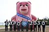Lotte representatives including Chairman Shin Dong-bin are holding signs to land support. [LOTTE]