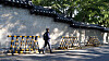 A pedestrian walks along Deoksugung Stonewall Walkway in central Seoul. [JOONGANG PHOTO]