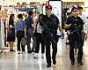 Armed police patrol Gangnam Station on Aug. 7 after a knife attack at Bundang, Gyeonggi, earlier this month led to threats in major locations and landmarks. [YONHAP]