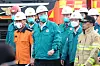 President Yoon Suk Yeol, center, visits the site of a fire that broke out at a lithium battery plant in Hwaseong, Gyeonggi, Monday. [JOINT PRESS CORPS]