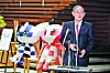 Japanese Prime Minister Yoshihide Suga, next to the mascots of Tokyo 2020 Olympic and Paralympic Games, speaks to media after announcing that Tokyo, Kyoto and Okinawa will receive pre-emergency status under a new prevention law during a government task force meeting at the Prime Minister’s Office in Tokyo on April 9, 2021. [YONHAP]