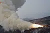 A solid-fuel engine for a 'new-type strategic weapons system' is tested on Dec. 15 in this footage broadcast by Pyongyang's state-controlled Korean Central News Television (KCTV). [YONHAP]