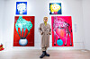 Mino from boy band Winner poses with his paintings at his first solo show 'Thanking You- Ohnim' at stART PLUS gallery in Seongdong District, eastern Seoul, on Thursday. [START PLUS]