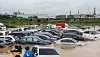 A used-car dealership in Suwon, Gyeonggi, is submerged as a heavy rain warning was issued for the capital and its surrounding areas on Thursday. [YONHAP]