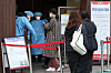People wait in line to get tested for Covid-19 at a testing center in Songpa District, western Seoul, on Wednesday. [NEWS1]