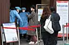 People wait in line to get tested for Covid-19 at a testing center in Songpa District, western Seoul, on Wednesday. [NEWS1]