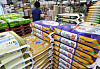 Sacks of rice are piled up at a large mart in Seoul on Monday. [NEWS1]