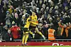 Wolverhampton Wanderers' Hwang Hee-chan, right, celebrates after scoring his side's second goal during an FA Cup match against Liverpool at Anfield in Liverpool, England on Saturday. [AP/YONHAP]