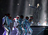 BTS member Jungkook sings 'Dreamers' at Sunday's opening ceremony of the 2022 Qatar World Cup, a performance that was edited out of Pyongyang's state-controlled Korean Central Television (KCTV) coverage of the event. [YONHAP]