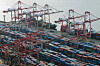 Containers are stacked at Busan Port on Jan. 1. [YONHAP]