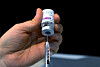 The AstraZeneca Covid-19 vaccine is prepared for injection. On Monday, Korea confirmed its first case of unusual blood clotting in someone who got the AstraZeneca vaccine. [KIM SEONG-TAE]