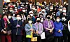 Voters listen to an election-related speech on a street in Seoul on Monday as they prepare to cast ballots to elect a new Seoul mayor on Wednesday. [NEWS1]