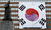 A banner of the Taegeukgi, the flag of Korea, embroidered by independence fighter Nam Sang-rak and his wife, hangs on the Kyobo Life building in Jongno District, central Seoul, on Aug. 3, ahead of the 80th anniversary of Korea's independence on Aug. 15. The hand-stitched flag, designated as a nationally registered cultural heritage item, was also displayed on the building in 2019 to mark the 100th anniversary of the March 1 Independence Movement. [NEWS1]