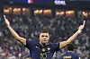 France's Kylian Mbappe celebrates scoring his side's opening goal against Denmark during a World Cup group D soccer match at the Stadium 974 in Doha, Qatar, on Saturday. [AP/YONHAP]
