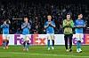 Napoli players applaud the crowd after drawing 1-1 with Milan to lose 2-1 on aggregate in a UEFA Champions League quarterfinal match at the Diego-Maradona stadium in Naples on Tuesday. [AFP/YONHAP]