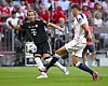 Bayern's Harry Kane, left, and Tottenham's Micky van de Ven challenge for the ball during a friendly between Bayern Munich and Tottenham Hotspur at the Allianz Arena, Munich, Germany, on Aug. 7. [AP/YONHAP]