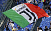 A Juventus fan waves a flag inside the Stadio Olimpico in Rome on May 11, 2022 before the final of the Coppa Italia.  [REUTERS/YONHAP]