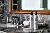 Signiel Hotel provides Diptyque bathroom amenities in multi-use dispensers. [LOTTE HOTELS & RESORTS]