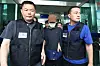 A man arrested for carrying a knife at Dongdaegu Station in Daegu earlier this week leaves a district court escorted by police on Wednesday after questioning. [NEWS1]