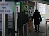 A person visits a Covid-19 testing center in Yongsan District, central Seoul, on Thursday. [YONHAP]