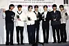 BTS members pose in front of cameras after being appointed as ambassadors for Busan's bid to host the 2030 World Expo in July at their agency HYBE in Yongsan District, central Seoul. [YONHAP]