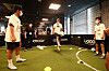Eric Dier, center, takes part in a Tottenham Hotspur Global football development session with young adults from ChildFund Korea on Monday in Yangcheon District, western Seoul. [TOTTENHAM HOTSPUR]
