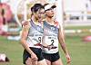 Kim Se-hee (right) and Kim Sun-woo console each other after finishing the women's modern pentathlon. [YONHAP]