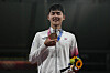 Jun Woong-tae celebrates on the podium during the medal ceremony for the men's modern pentathlon at the 2020 Summer Olympics on Saturday in Tokyo, Japan. [AP/YONHAP]