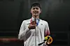 Jun Woong-tae celebrates on the podium during the medal ceremony for the men's modern pentathlon at the 2020 Summer Olympics on Saturday in Tokyo, Japan. [AP/YONHAP]
