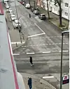 The photo shows a scene of the hate crime site, captured by a neighbor of the victim in Duisburg, Germany. A witness and one of the two men who assaulted the victim are shown in the photo. [YONHAP]