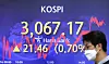 A screen in Hana Bank's trading room in central Seoul shows the Kospi closing at 3,067.17 points on Tuesday, up 21.46 points, or 0.7 percent from the previous trading day. [NEWS1]