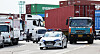 A cargo truck being escorted out of a port in Euiwang, Gyeonggi. [YONHAP]