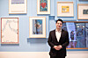 Mark Tetto poses in front of numerous Kim Whanki (1913-1974) paintings at the Whanki Museum in central Seoul last week. [WHANKI MUSEUM]