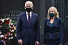 U.S. President-elect Joe Biden and his wife Jill Biden pay respects in a Veterans Day stop at the Korean War Memorial Park in Philadelphia on Wednesday. The visit took place hours before President Moon Jae-in had his first phone call with Biden on Thursday. [AFP]