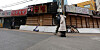 Pedestrians walk by closed restaurants in Sinchon, western Seoul, on Tuesday. Korea's industrial landscape dramatically changed over the past five years as manufacturing, retail and service businesses shrunk. [NEWS1]