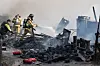 Firefighters battle a fire that broke out in Guryong village in southern Seoul, on Friday morning. [YONHAP]