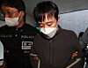 Jeon Joo-hwan is transferred from Seoul Namdaemun Police Station to the Seoul Central District Prosecutors Office on Sept. 21. [NEWS1]