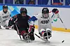 Cho Byung-suk, right, of Korea in action against Anton Jacobs-Webb of Canada during a group stage game at the National Indoor Stadium in Beijing on Tuesday. [YONHAP]